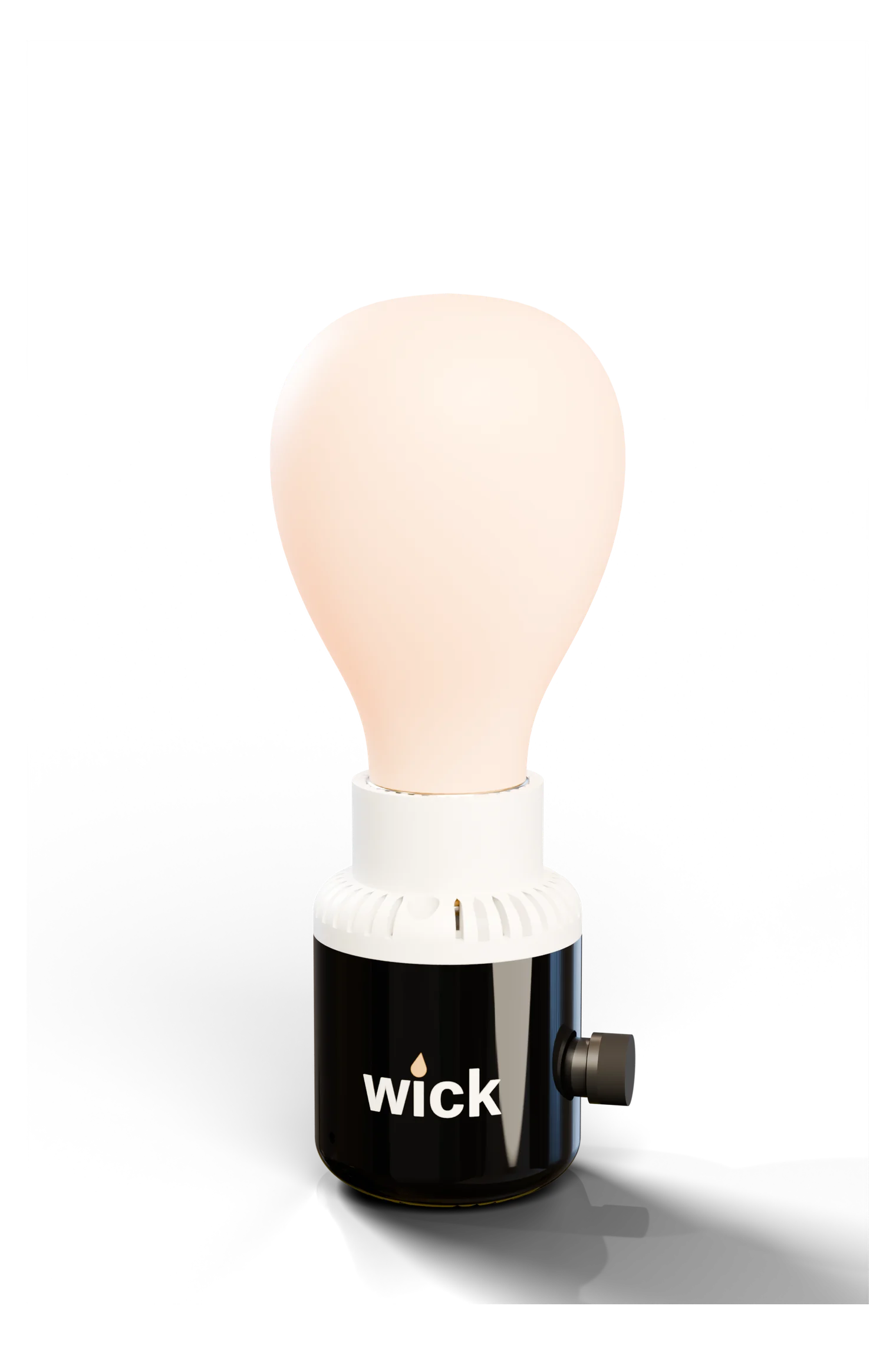 The wick socket in Tuxedo, bell shape, white top and black base, holding a glowing bulb